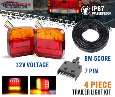 Trailer light kit with red and orange lights, cable, and connector on a white background.