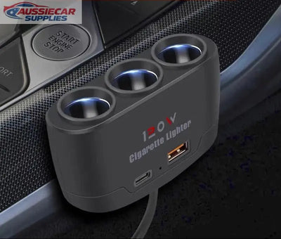 Car cigarette lighter with multiple ports on a car dashboard