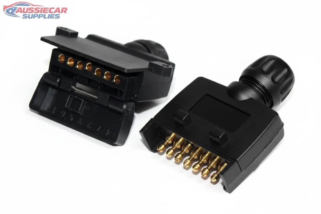 Two black electronic connectors with gold contacts on a white background
