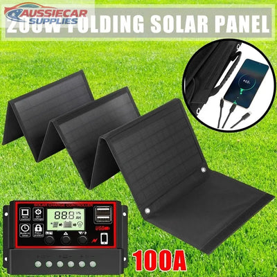 200W folding solar panel with controller on grass background