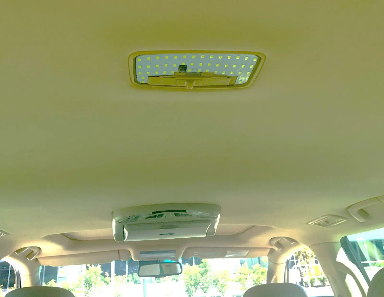 Car interior with a sun visor and ceiling light. 200 series landcruiser ...