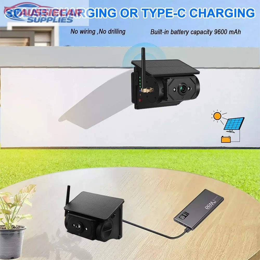 Wireless Solar Rear Camera Wireless camera with solar panel and charging cable on a wooden surface ...