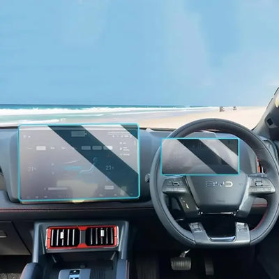 Car interior BYD SHARK with a transparent protective film on the dashboard and steering wheel.